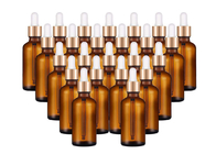 Garrafas de vidro vazias do tampão dourado para o uso dos cuidados pessoais dos óleos essenciais