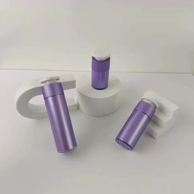 Garrafa de plástico de plástico roxo com bomba de pressão branca