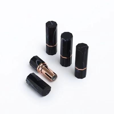 Contenedor de tubos de batom octagonal com acento dourado rosa