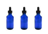 Garrafas de óleo essencial vazias azuis que armazenam produtos químicos da química dos perfumes